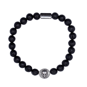 Ein Edelstahlarmband mit Lavasteinen Totenkopf als Bead